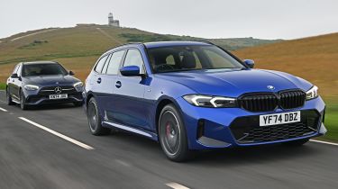 BMW 330e vs Mercedes C 300 e twin test - front angled